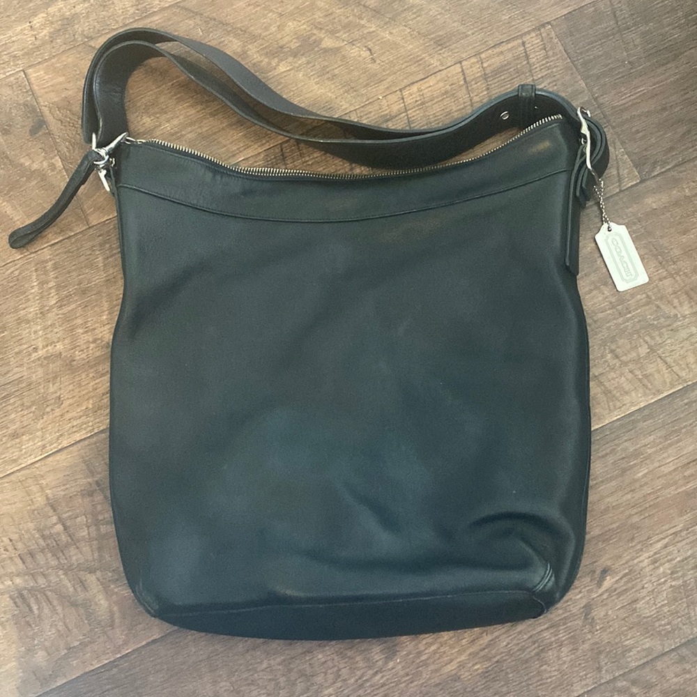 Large black leather Coach purse.